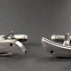 Illustration for article titled Dress to Kill (Or Just Prick) With a Set of Pocket Knife Cufflinks